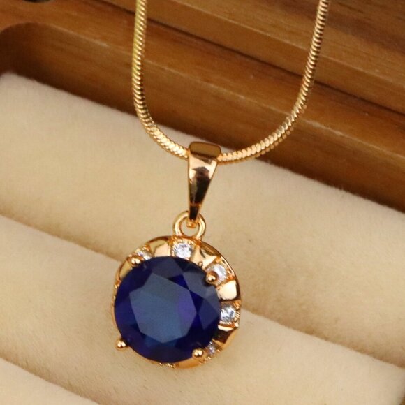 "Royal Blue Round Pendant with Sparkling Accents in Gold Finish, XPPT1647 - Picture 1 of 13